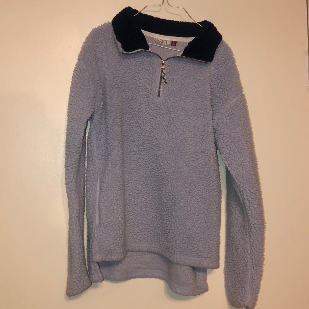 Light blue and navy Sherpa sweater with pockets.